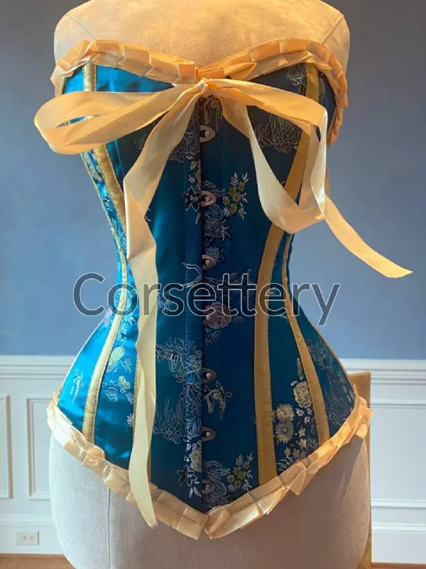 Bright blue brocade steampunk corset with ribbons and bow. Steel-boned corset for tightlacing. Prom, gothic, steampunk Victorian corset.